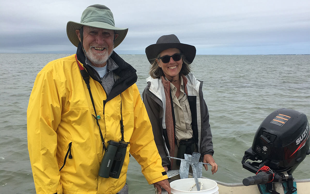 : Brian Harrington and Ginny Carter conducting a survey on Monomoy National Wildlife Refuge